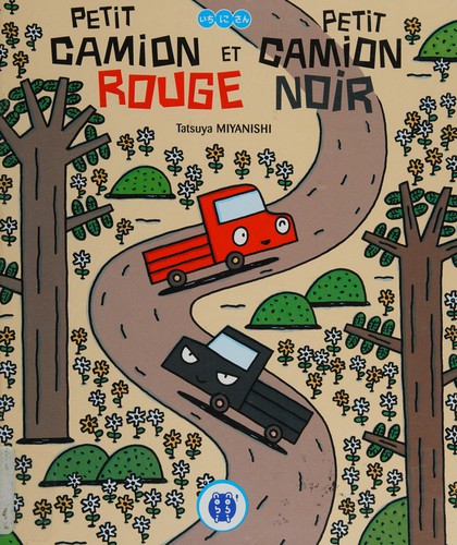 Petit camion rouge et petit camion noir